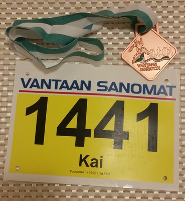 Bib number and finisher's medal